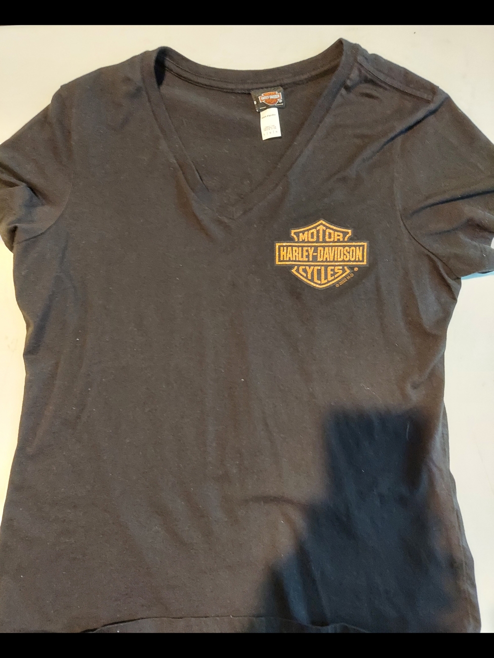 Women's Harley-Davidson Las Vegas Black V-Neck Tee with Gold Logo